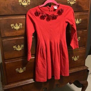 E. Land red dress
